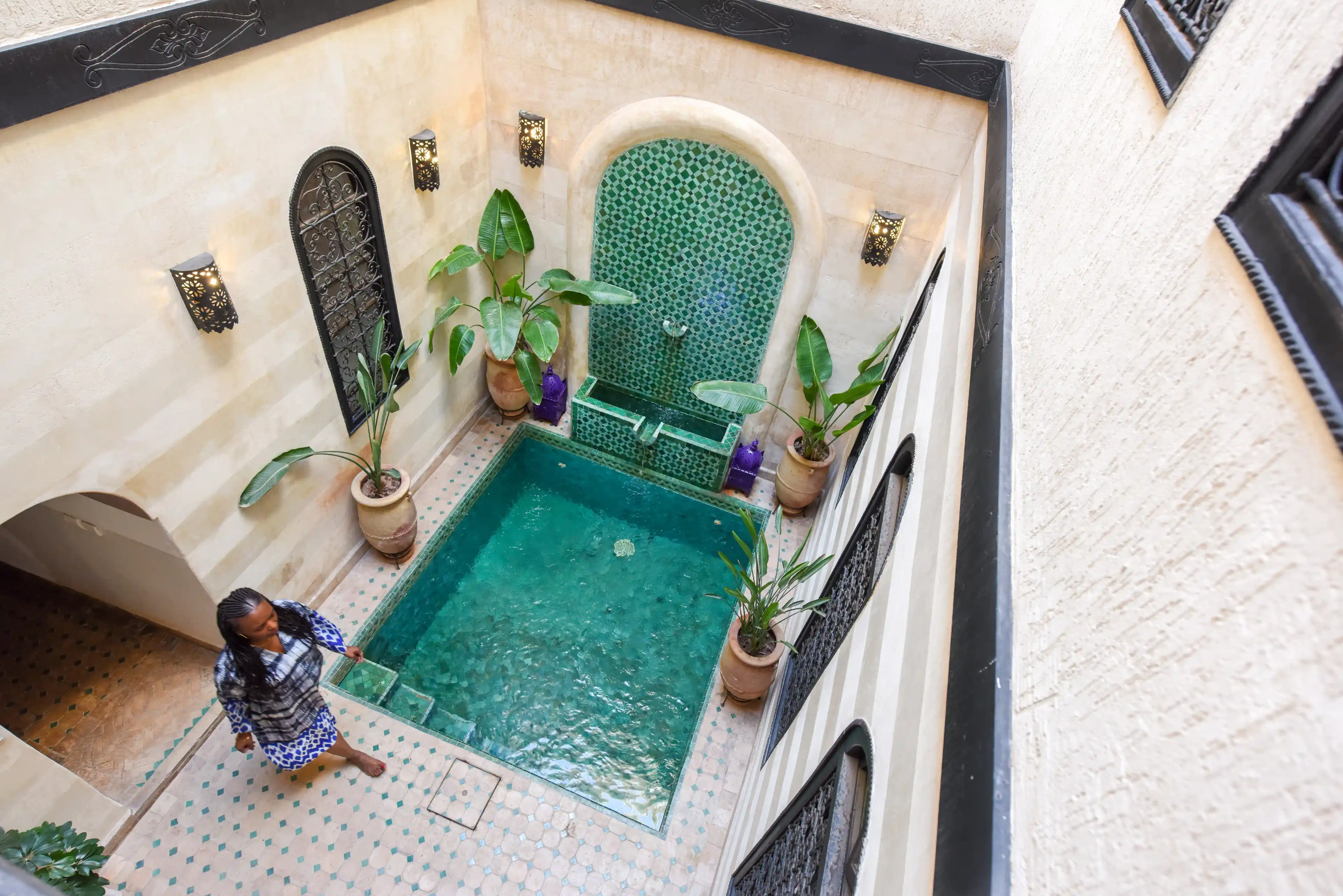 This Superior Junior Suite of our guesthouse is equipped with a queen-size double bed and a private patio with a heated pool