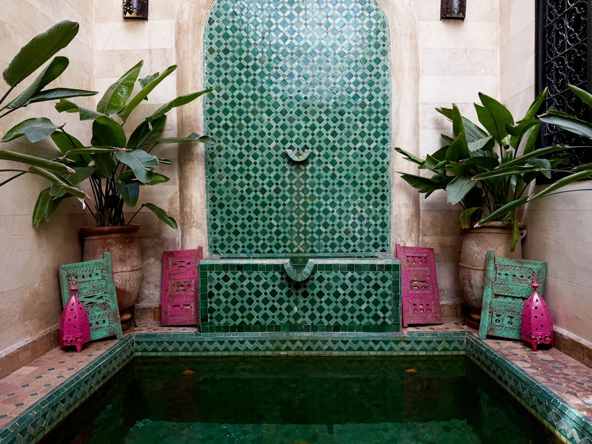 This Superior Junior Suite of our guesthouse is equipped with a queen-size double bed and a private patio with a heated pool